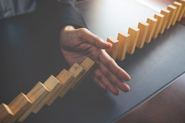 Problem Solving,Close up view on hand of business woman stopping
